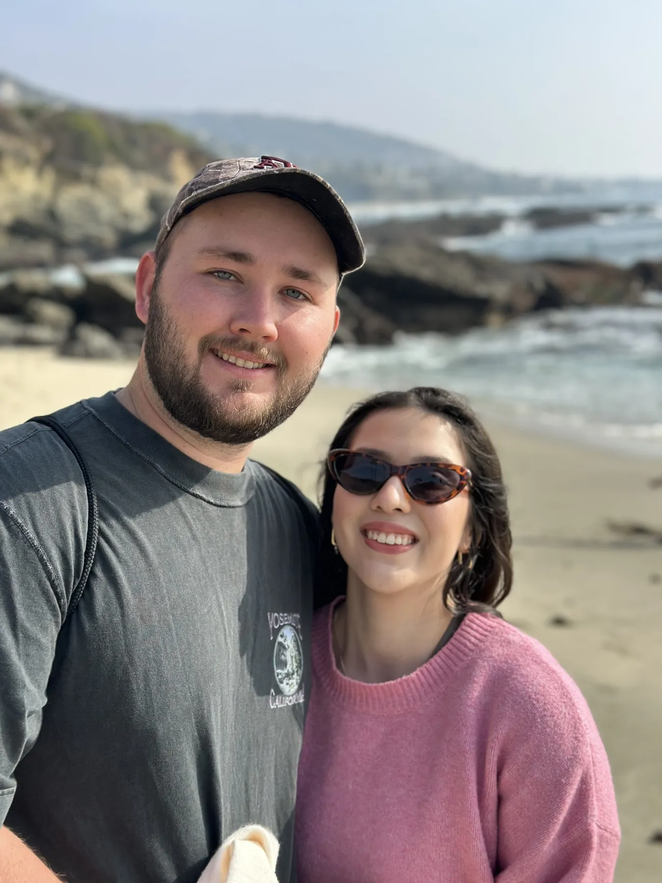 A couple visiting the coast