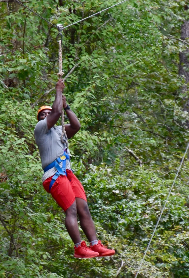 A traveler enjoying an outdoor adventure